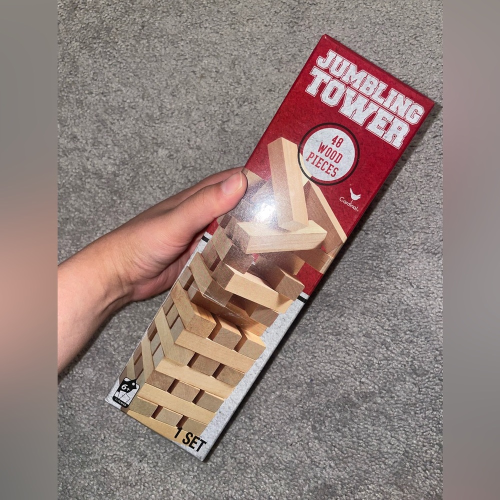 NWT jumbling tower wood pieces board game